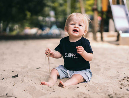 SLOPPEL. Baby body zwart voorkant