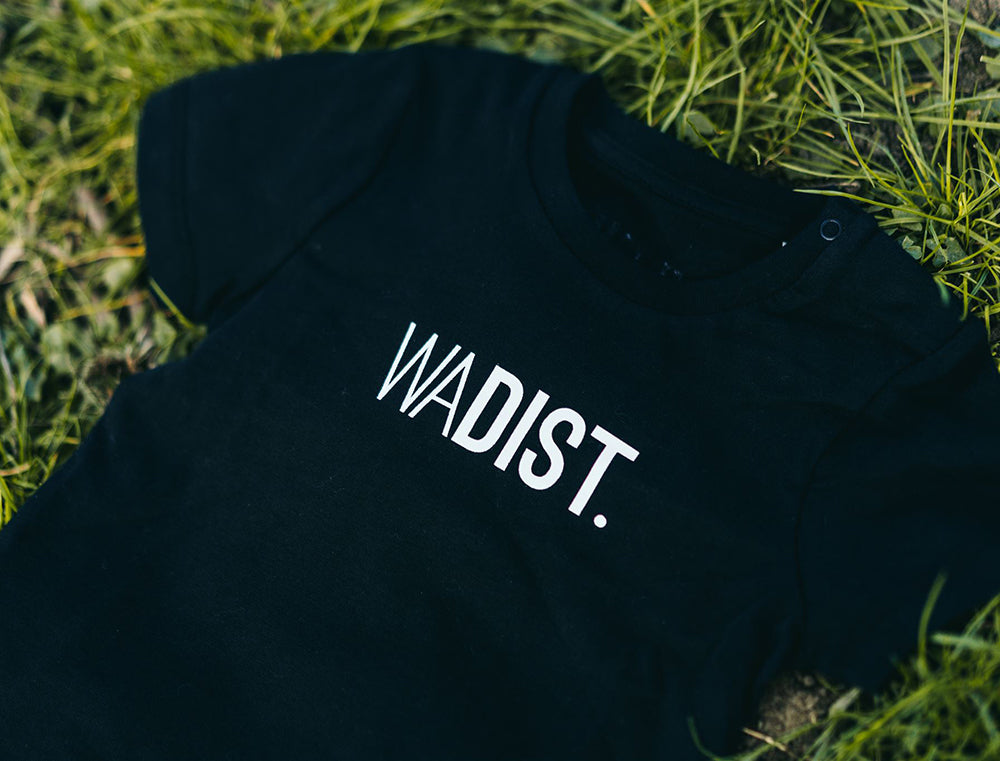 Zwarte baby T-shirt met opdruk WADIST.