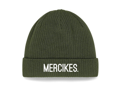 Groene muts met opdruk MERCIKES.