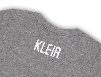 Achterkant van grijs PATEEKE. rompertje voor baby's van KLEIR.
