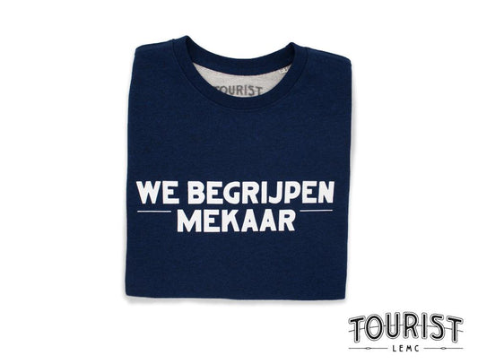 Blauwe trui met opdruk we begrijpen mekaar.